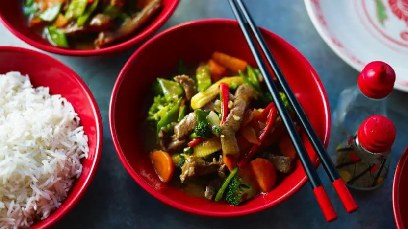 Beef Stir Fry in red bowl plating idea