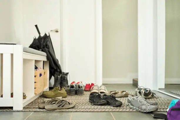 cluttered shoes - reduce by creating a shoe display case