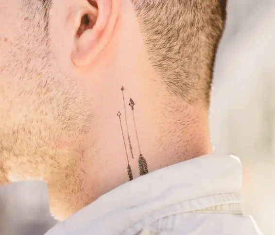 picture of a arrow tattoo on the neck showing Minimalist Neck Tattoo