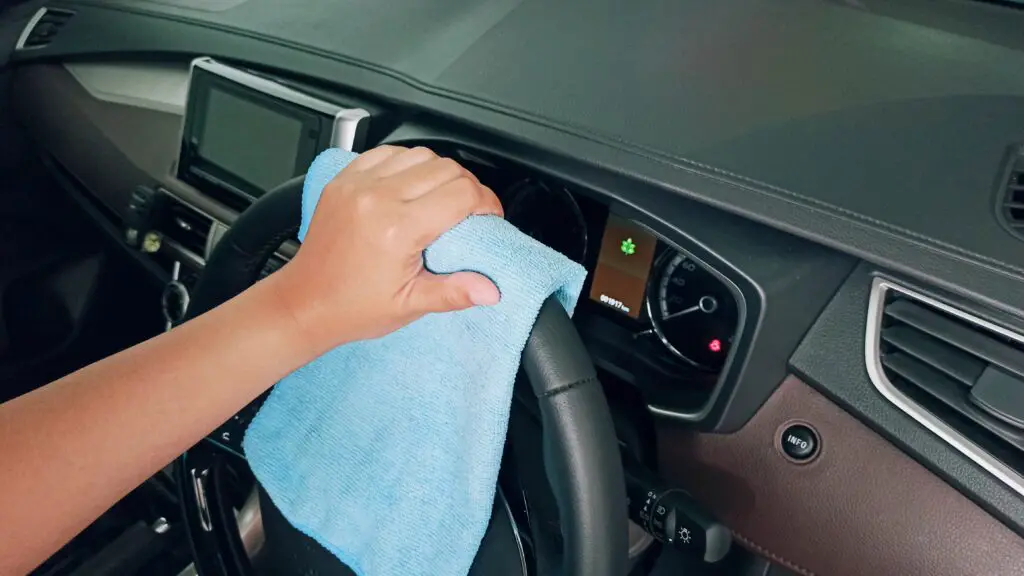 Clean the interior of your car with a vacuum or wet cloth