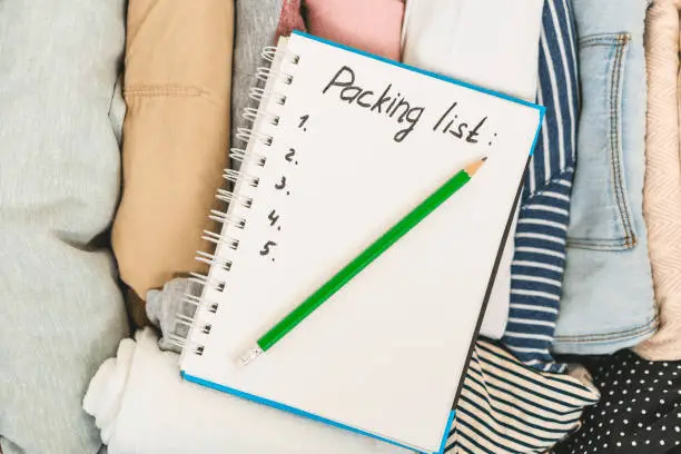 making a packing list as one of the important packing strategies