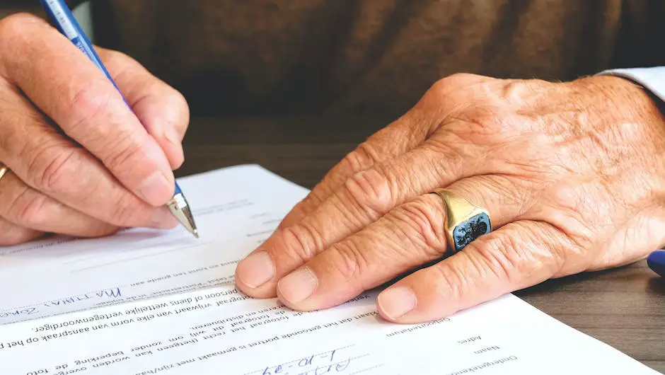 Image of a person signing a legal agreement for startups.